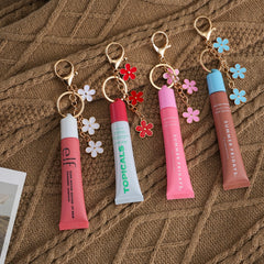 Limpskys charm detail on keychain cap, stylish identification charm
