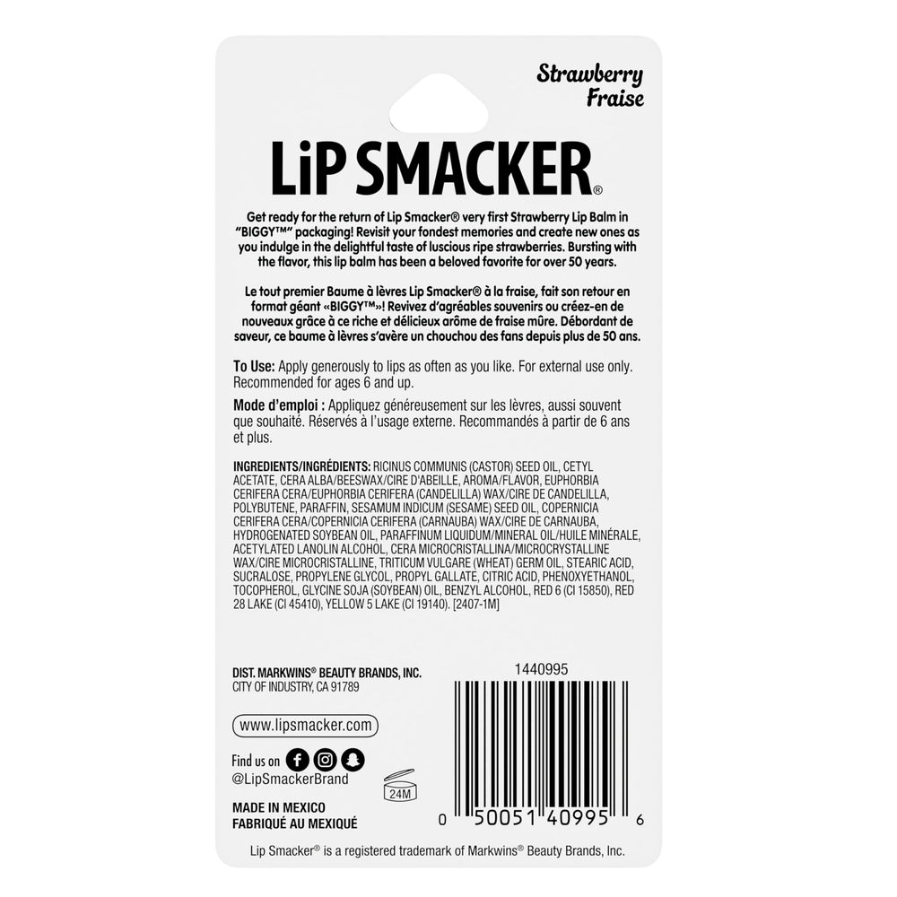 Person smiling wearing Lip Smacker Biggy Strawberry showcasing moisturizing shine and joyful vibe