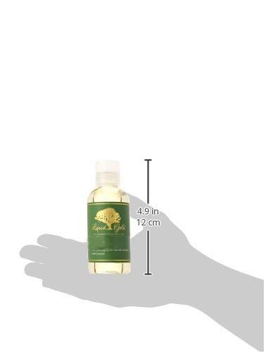 Liquid Gold Inc applying oil to hair ends for shine and frizz control