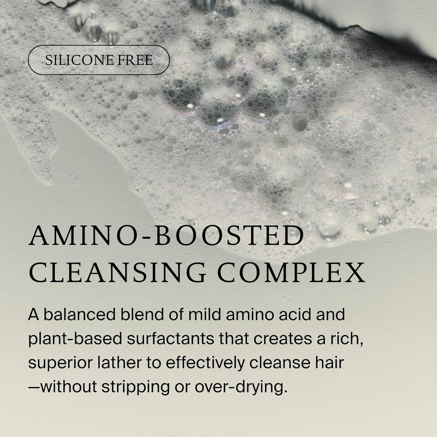 Living Proof applying shampoo to wet hair for effective cleansing