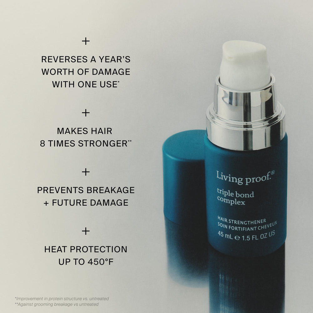 Living Proof mask in hand being applied to damp hair for easy at-home repair