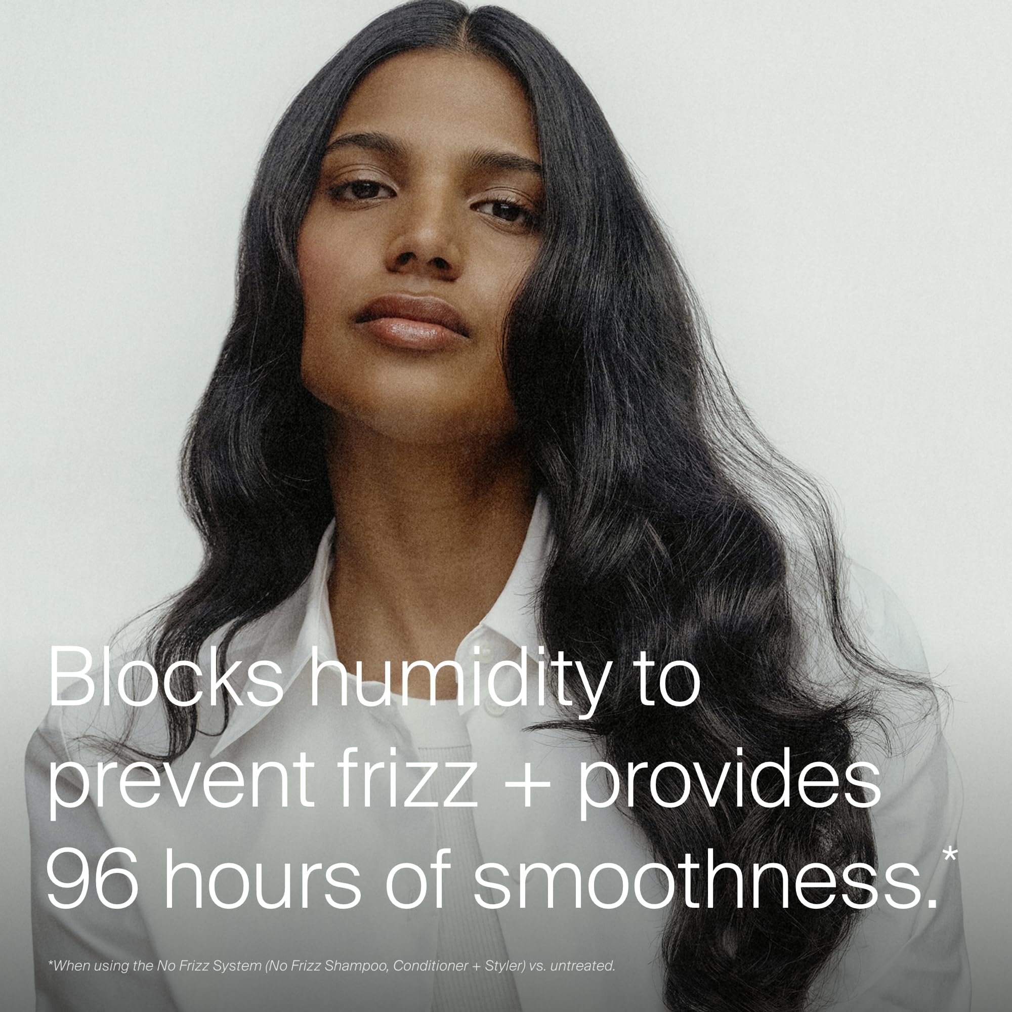 Living Proof cream on hand demonstrating easy distribution and control
