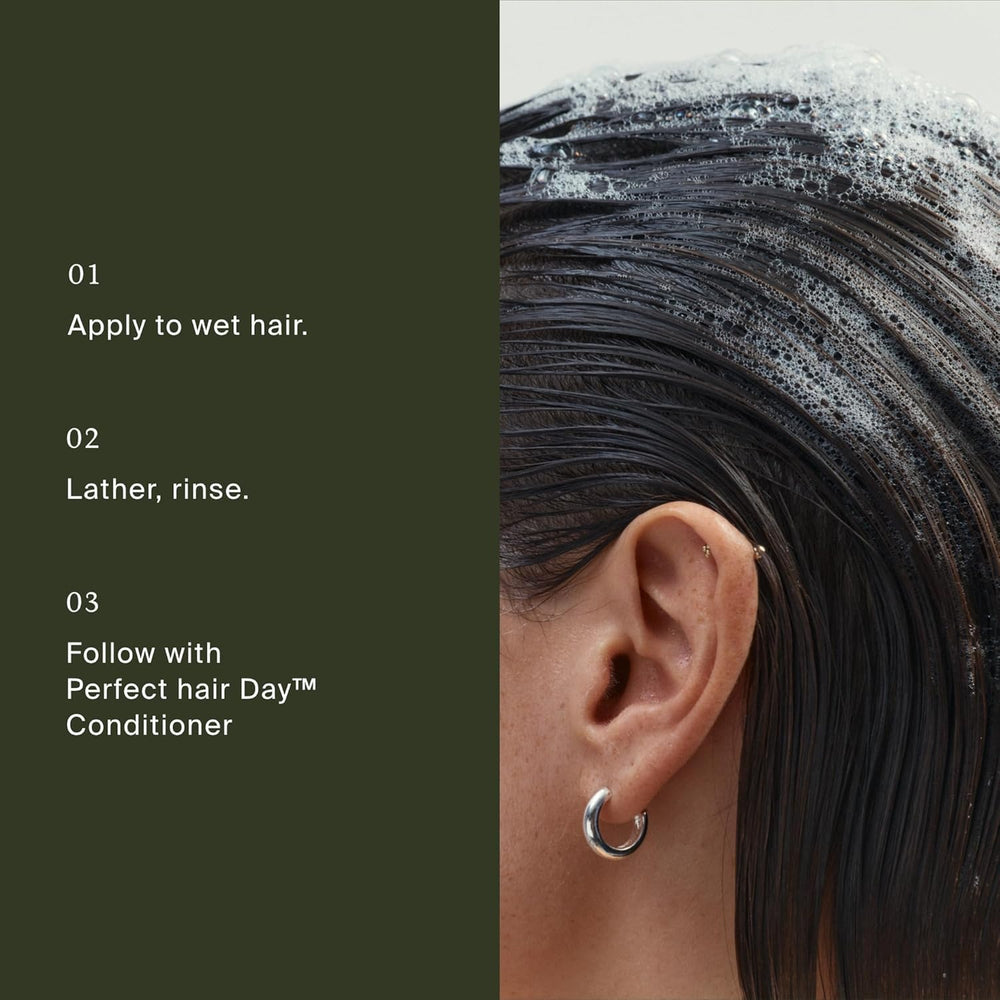 Living Proof shampoo paired with conditioner suggesting a complete routine