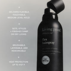 Living Proof travel-size bottles next to passport to show compact scale