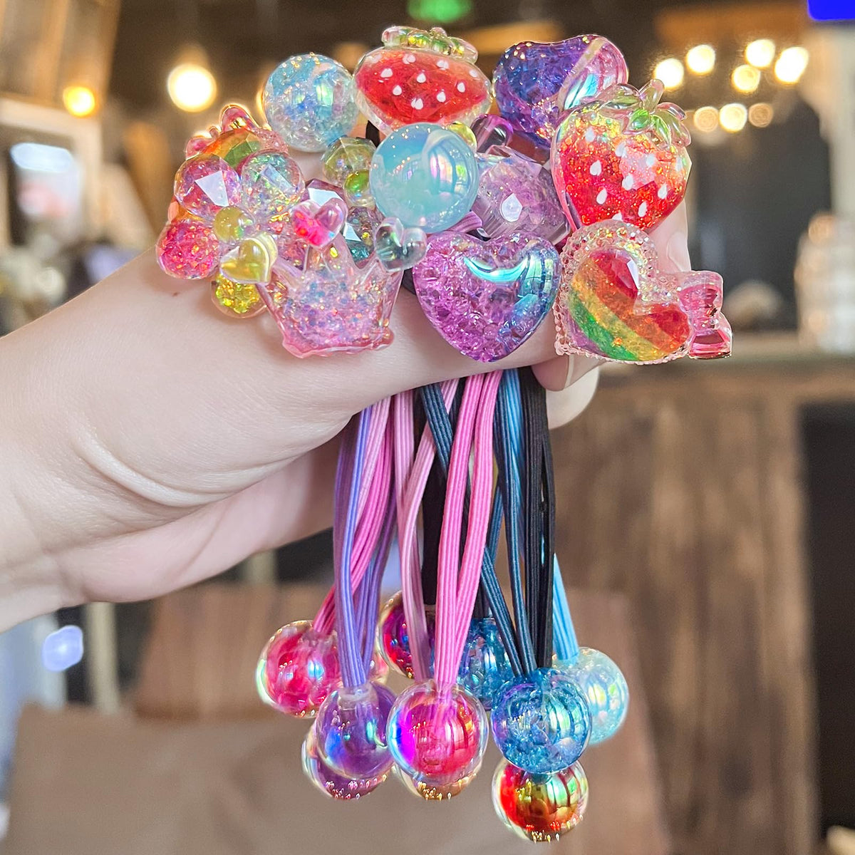 LIYAZHIL front packaging showing 12 colorful bead hair ties, easy selection