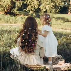 Lizioo mini flower clip in hair demonstrating discreet hold and decorative boost