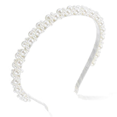 LLOUSSAK front view of white pearl headband showing elegant styling benefit
