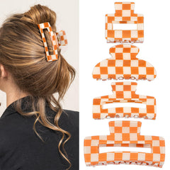 LLOUSSAK front view of four orange white checkered clips showing variety and style benefit