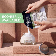 L'OCCITANE lifestyle image applying cream to legs for softer-looking skin