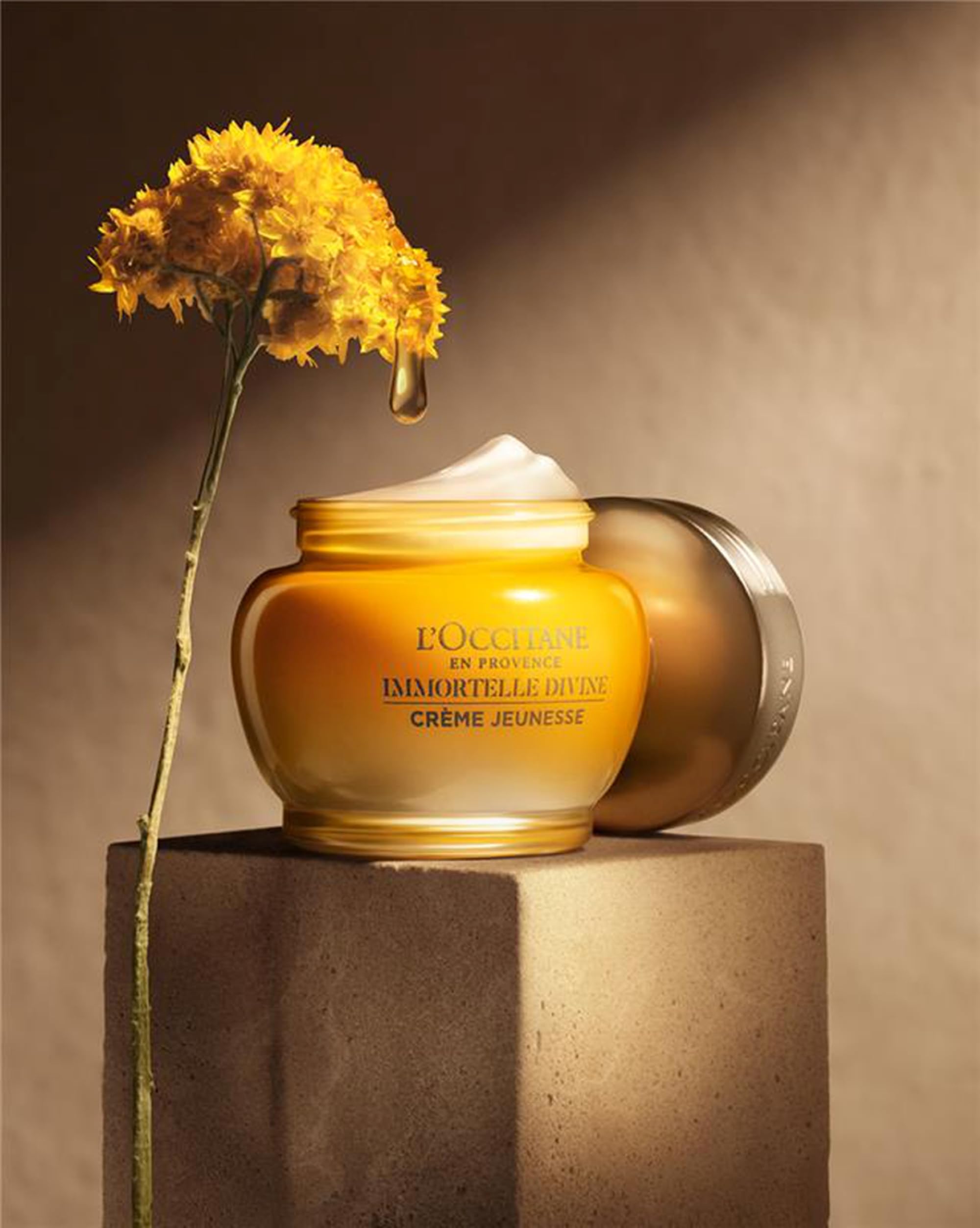 L'OCCITANE cream texture close-up demonstrating smooth, cashmere-like finish and nourishment