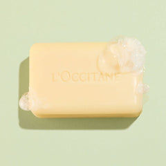 L'Occitane Shea Verbena soap texture close-up highlights creamy bar and softening benefit