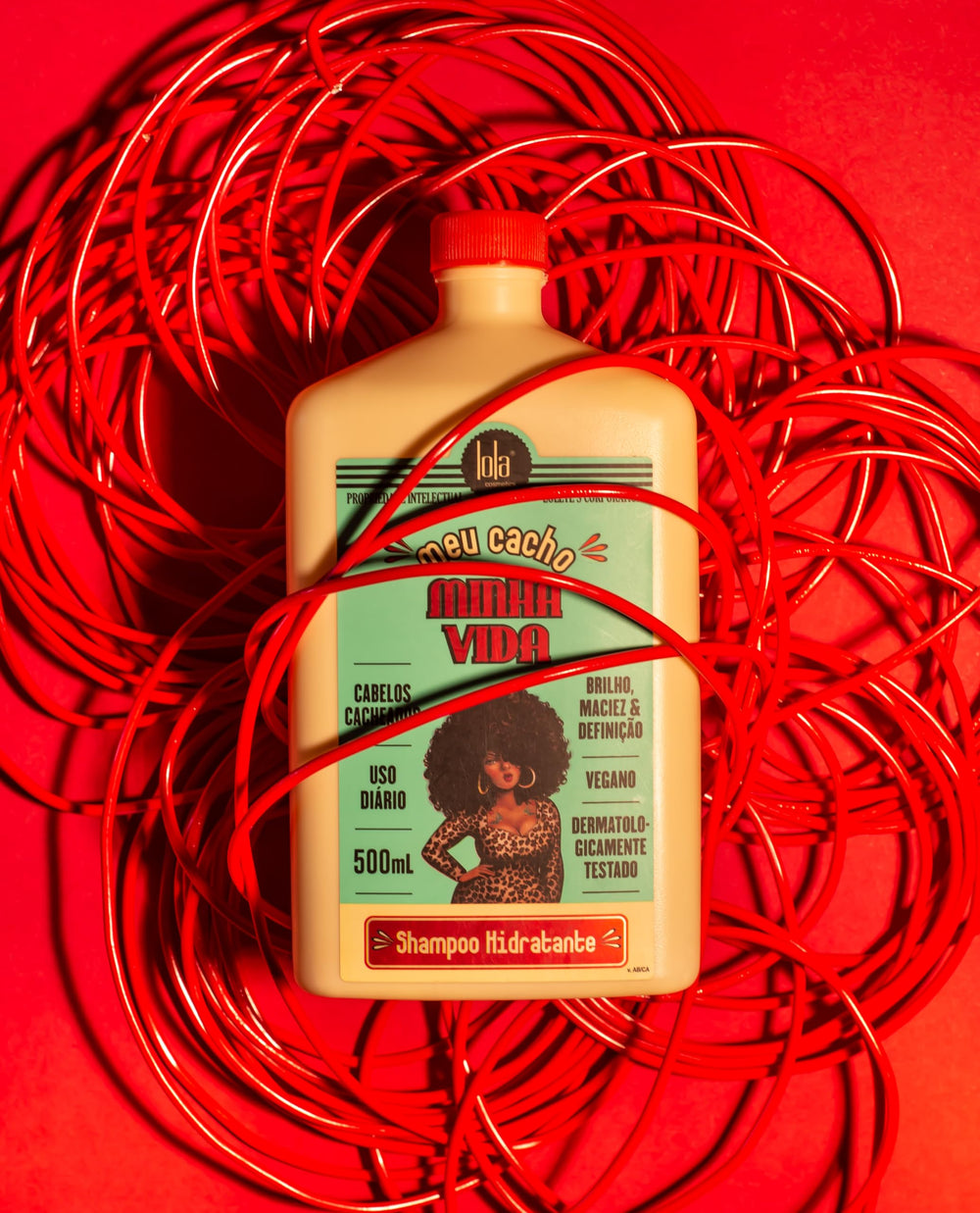 Lola shampoo creamy texture closeup highlighting hydration and slip