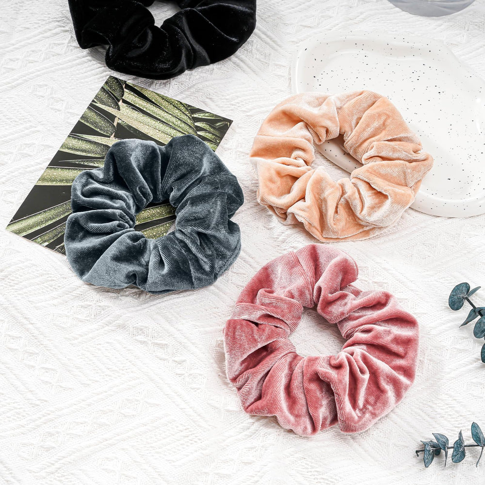 Lolalet scrunchie held in hand to show large size and full coverage