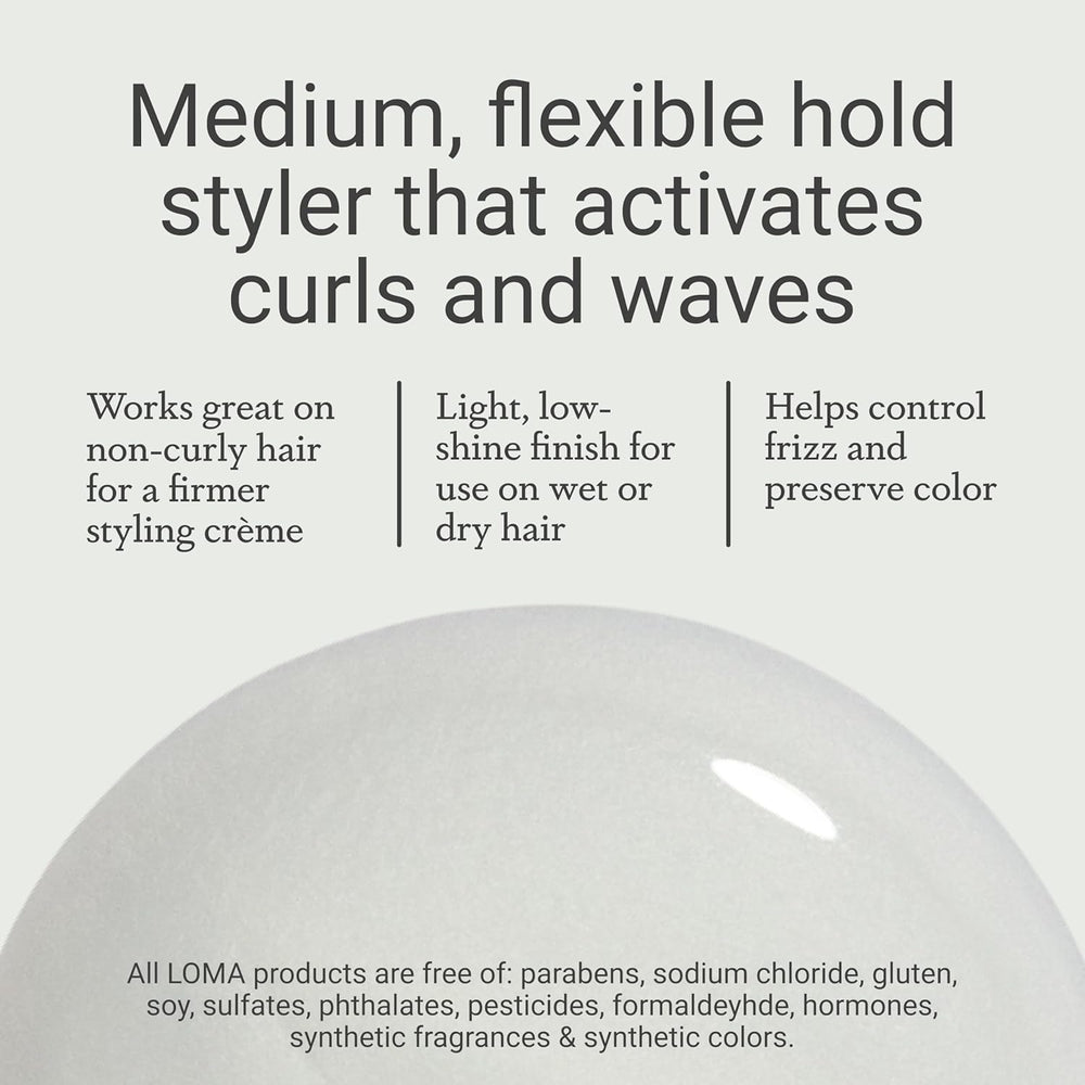 Loma Curvy Crème next to a hand for scale showing compact travel-friendly benefit
