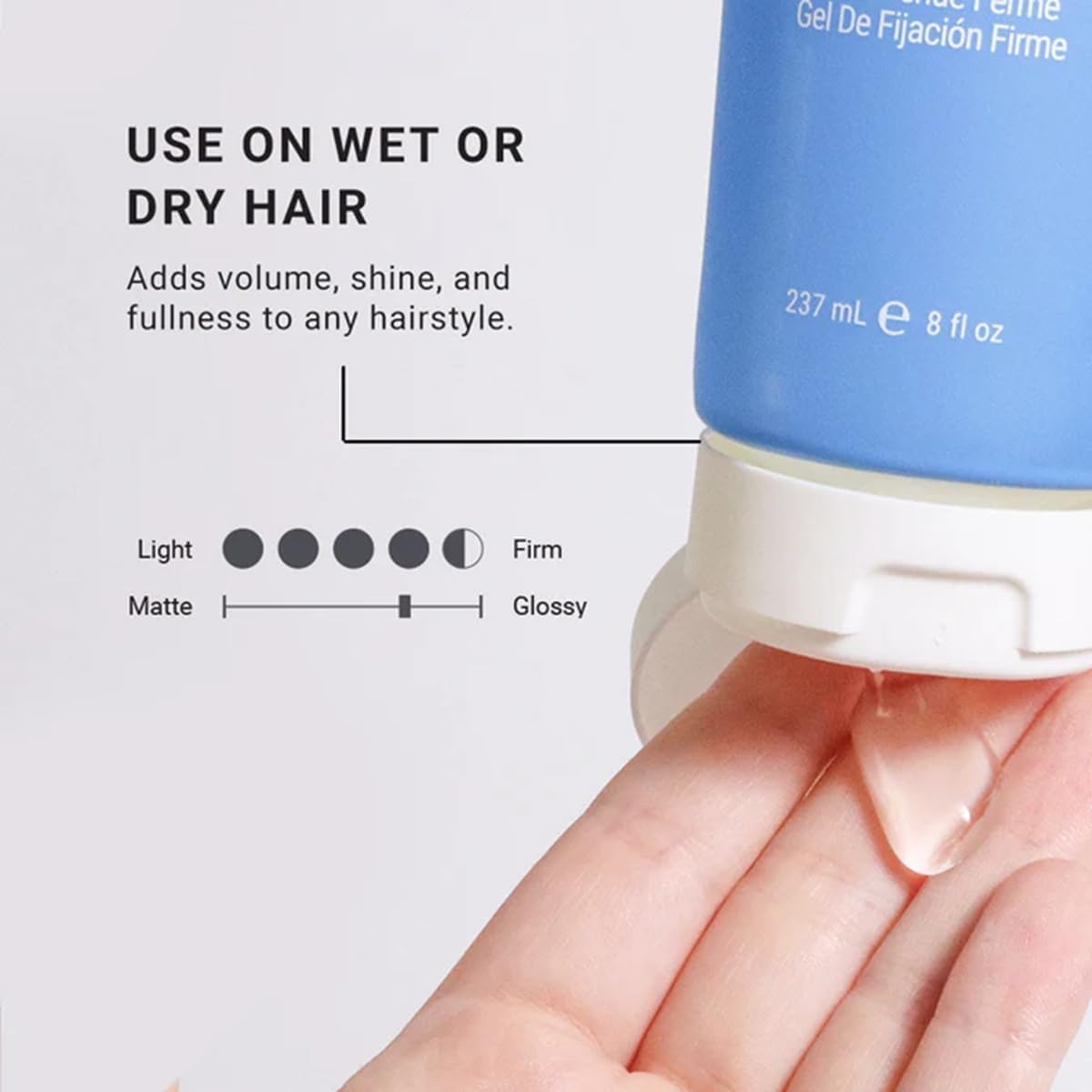 Loma 3 fl oz gel beside a smartphone for scale, showing travel-friendly size advantage