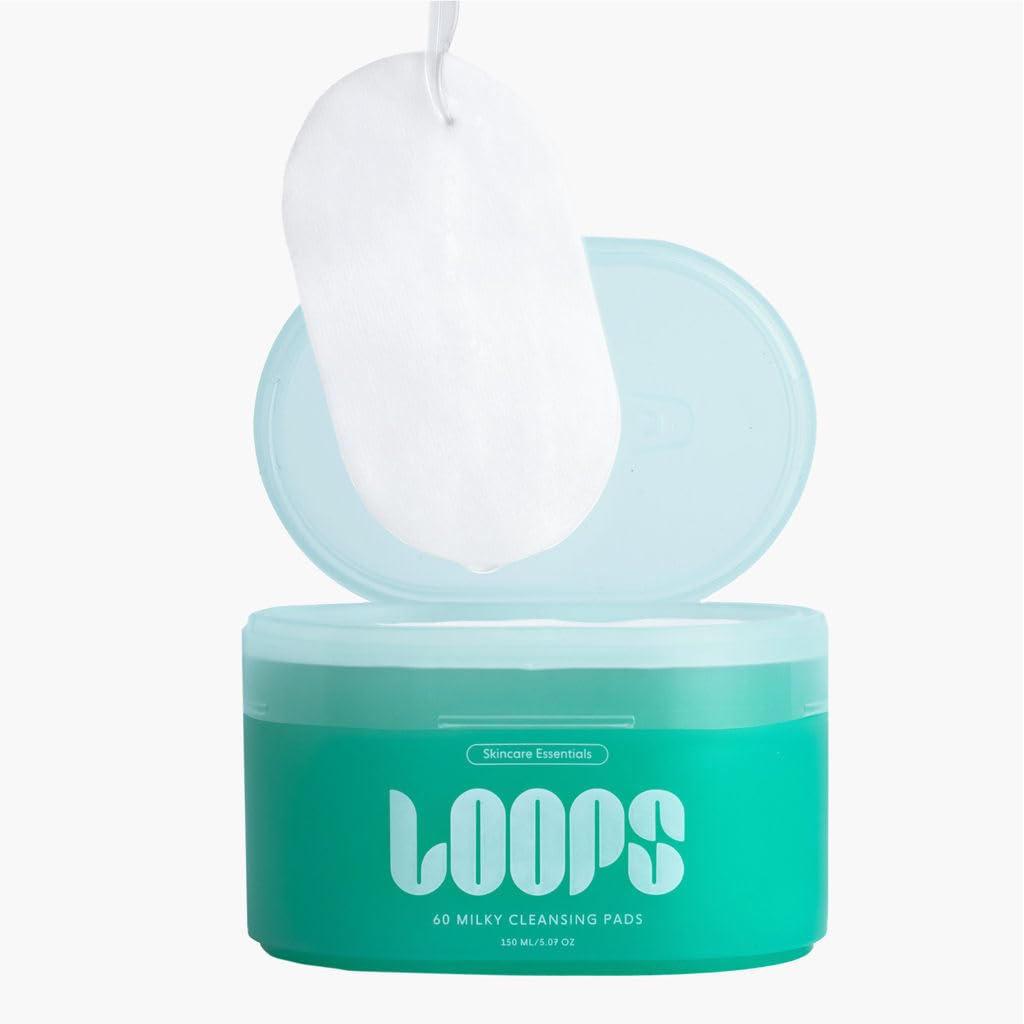 LOOPS pad held in hand to show scale and convenient single-use benefit