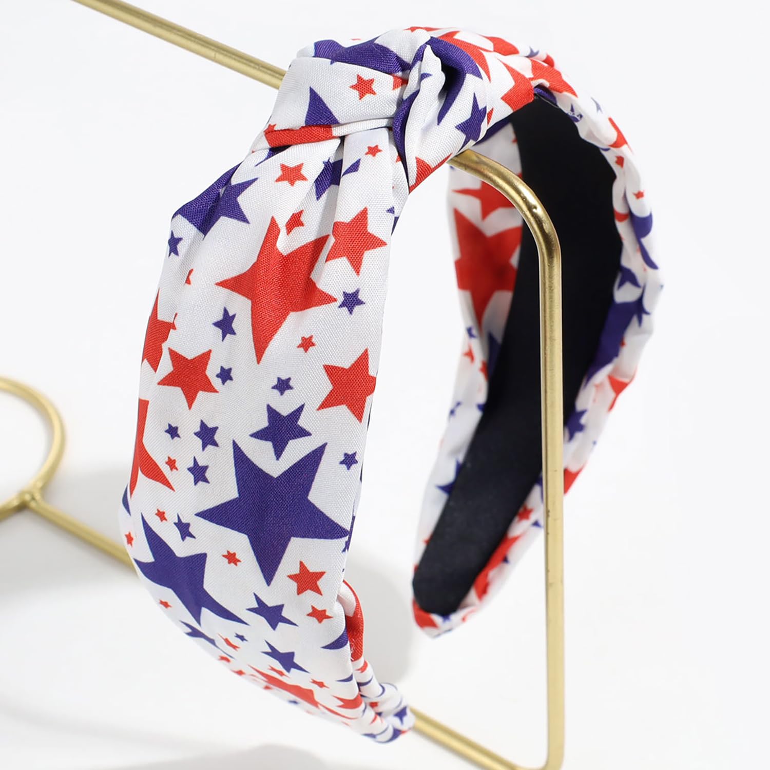 LOPMNGHT detailed shot of red and blue five-pointed stars for bold festive look