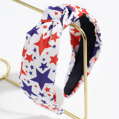 LOPMNGHT detailed shot of red and blue five-pointed stars for bold festive look