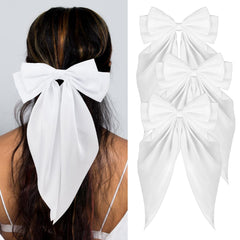 loqpol oversized white bow front view showing elegant drape and shine