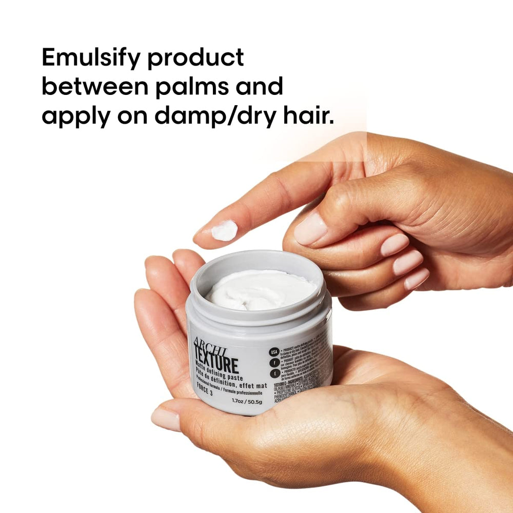 L'Oréal Professionnel applying pomade to dry hair to create piecey, defined matte style.