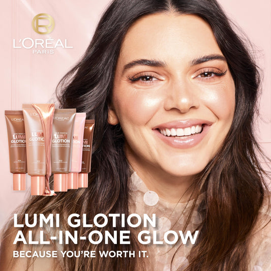 L'Oreal Paris Lumi Glotion dropper dispensing a luminous drop for precise application