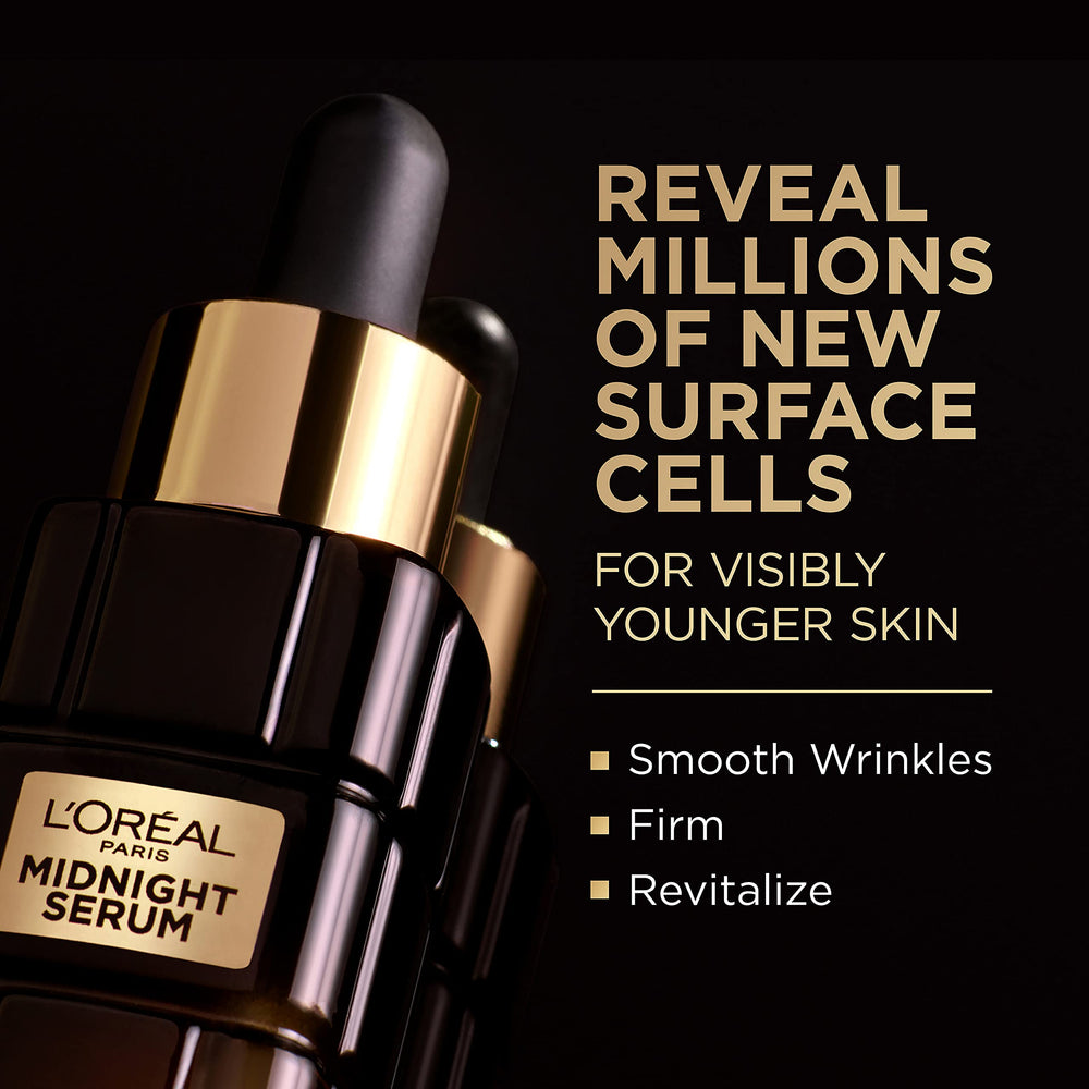 L'Oreal Paris close-up of etched glass bottle detail highlighting recycled glass and gold finish