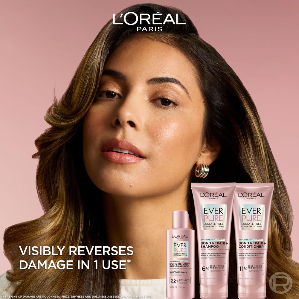 L'Oreal Paris shampoo being dispensed showing creamy texture and gentle cleanse