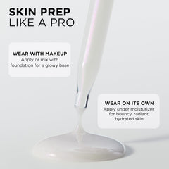 L'Oreal Paris bottle beside moisturizer showing layering under skincare