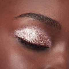 L'Oreal Paris lifestyle photo of evening makeup with Rose Gem, high-impact glow benefit