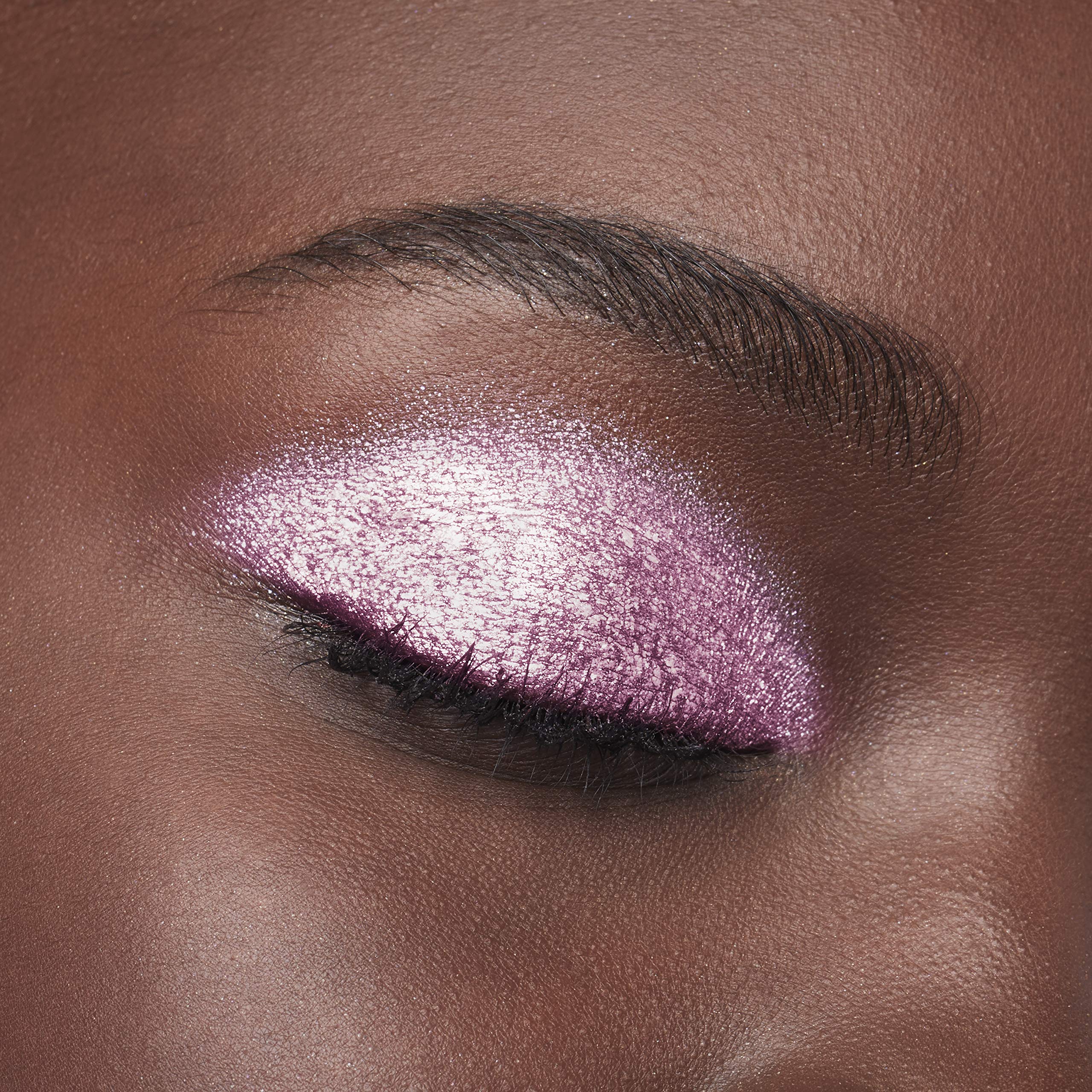 L'Oreal Paris placed in makeup bag for on-the-go touch-ups and convenience