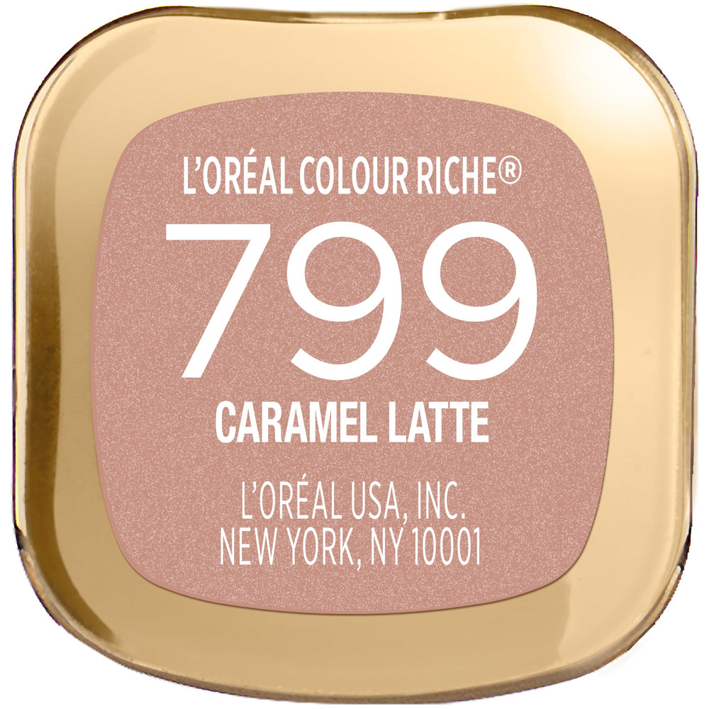 L'Oreal Paris Colour Riche beside coin showing compact size and travel-friendly benefit