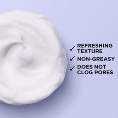 L'Oreal Paris cream being absorbed on hand to show fast-absorbing, non-greasy benefit