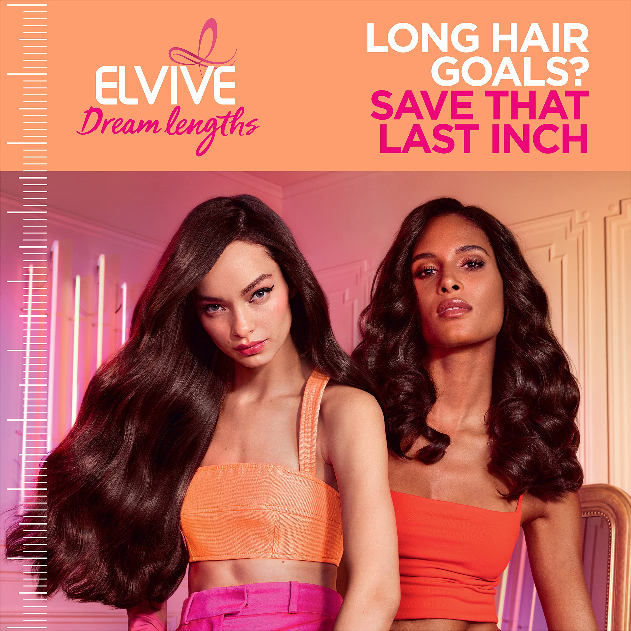 L'Oreal Paris being applied to long hair mid‑lengths to improve strength and manageability benefit