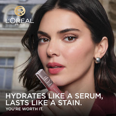 L'Oreal Paris swiped on lips showing corally brown nude and natural enhancement