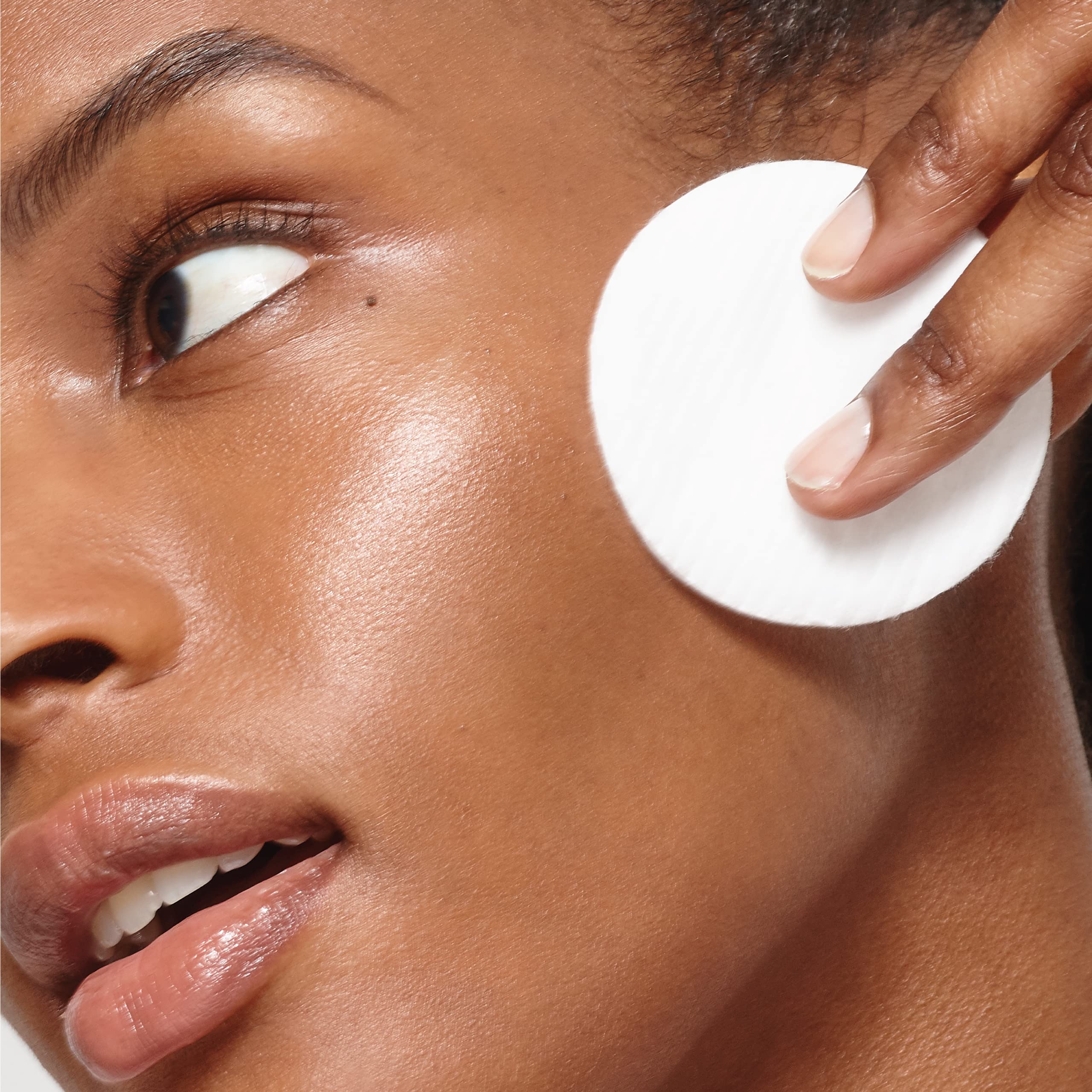 L'Oreal Paris application on cotton pad demonstrating easy makeup residue removal