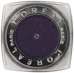 L'Oréal Paris pot next to a coin showing compact travel-friendly size