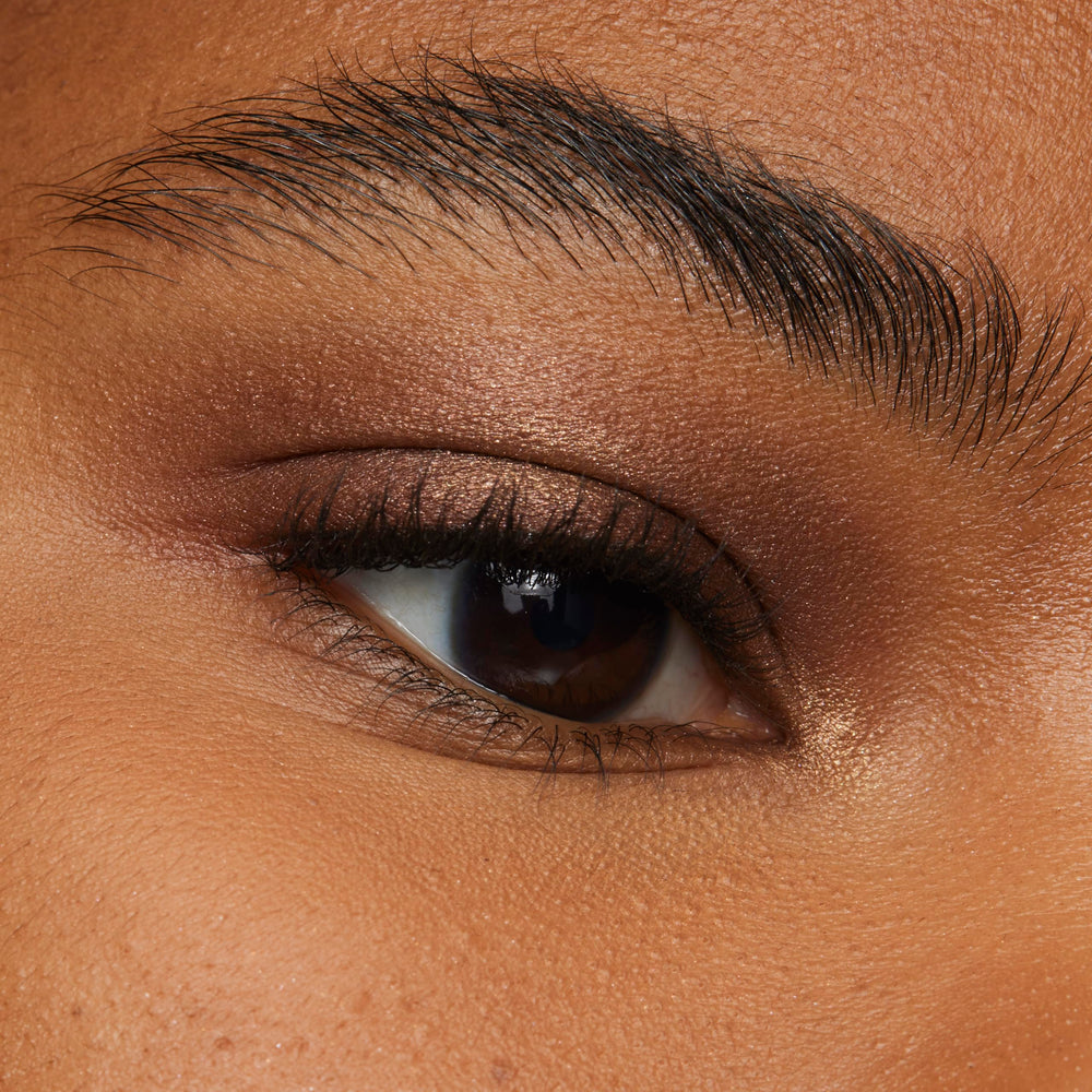 L'Oreal Paris stick with cap open showing twist-up design for mess-free application benefit
