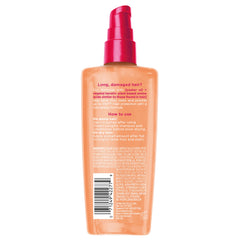 L'Oreal Paris model with sleek long hair demonstrating frizz control
