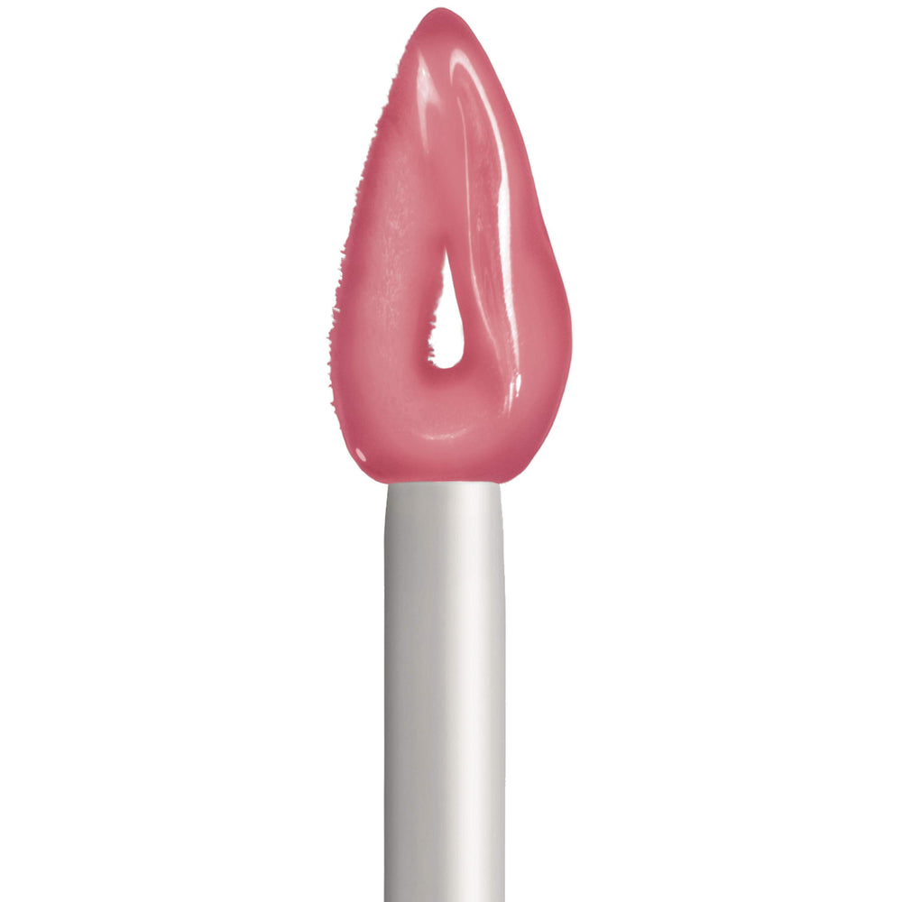 L'Oréal Paris gloss worn on lips in lifestyle scene showcasing hydrated, high-shine look