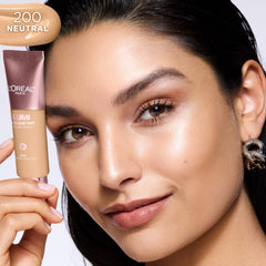 L'Oreal Paris applying tint with fingers showing blendability and natural finish