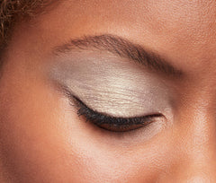 Lifestyle image of evening makeup look using L'Oreal Paris shadow for radiant nighttime glam