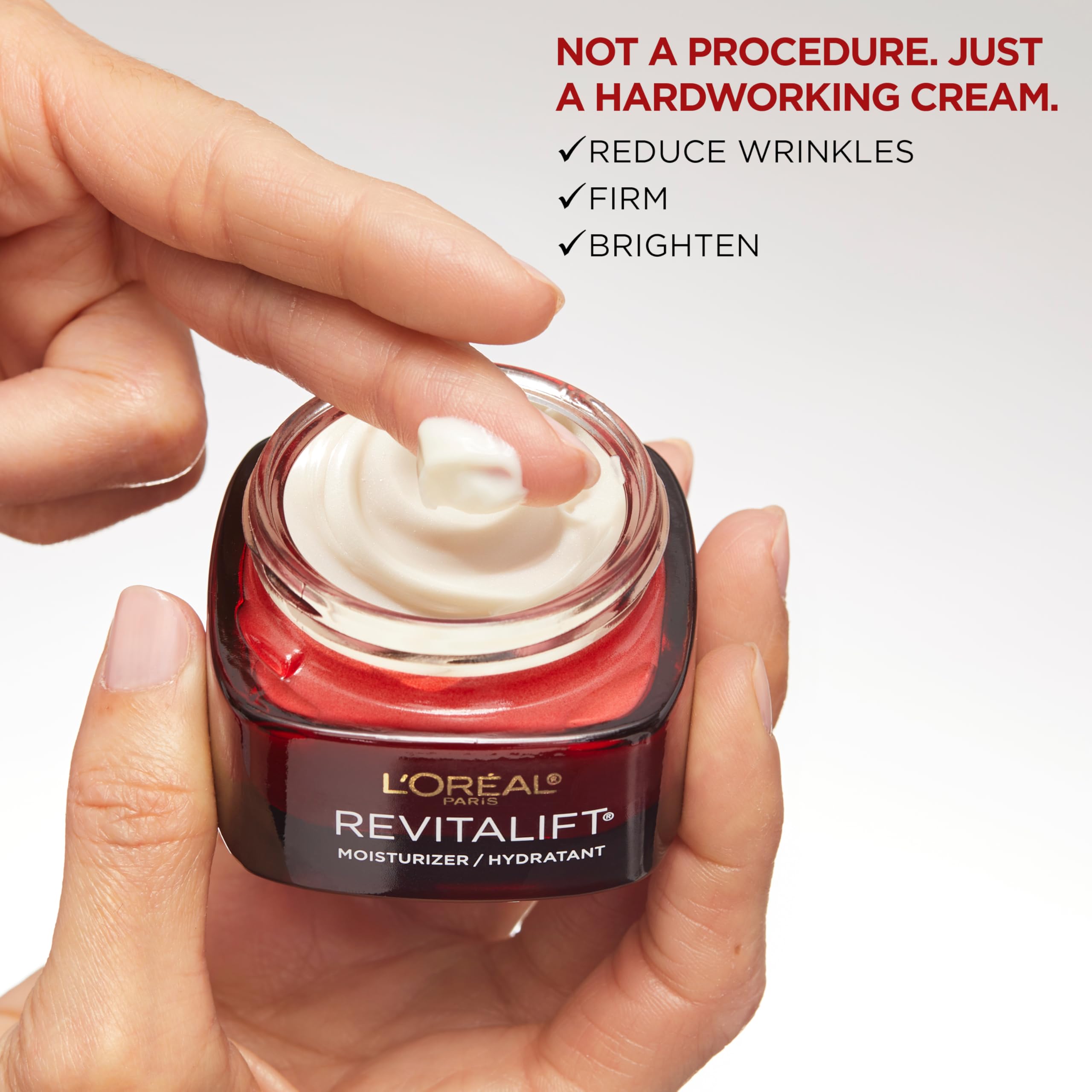 L'Oreal Paris Revitalift paired with serum illustrating layered anti-aging routine