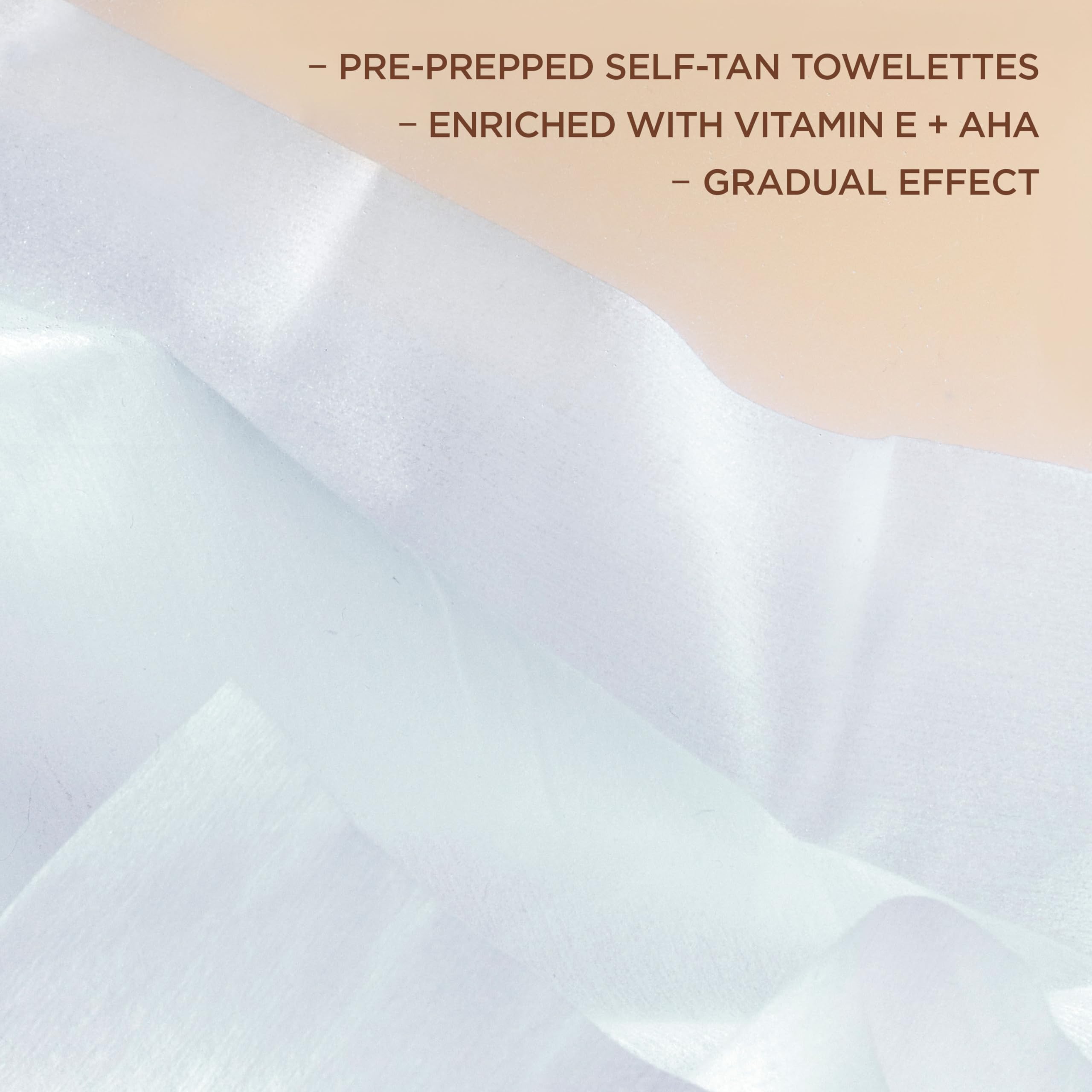 L'Oreal Paris applying towelette to leg, demonstrates streak-free blending benefit