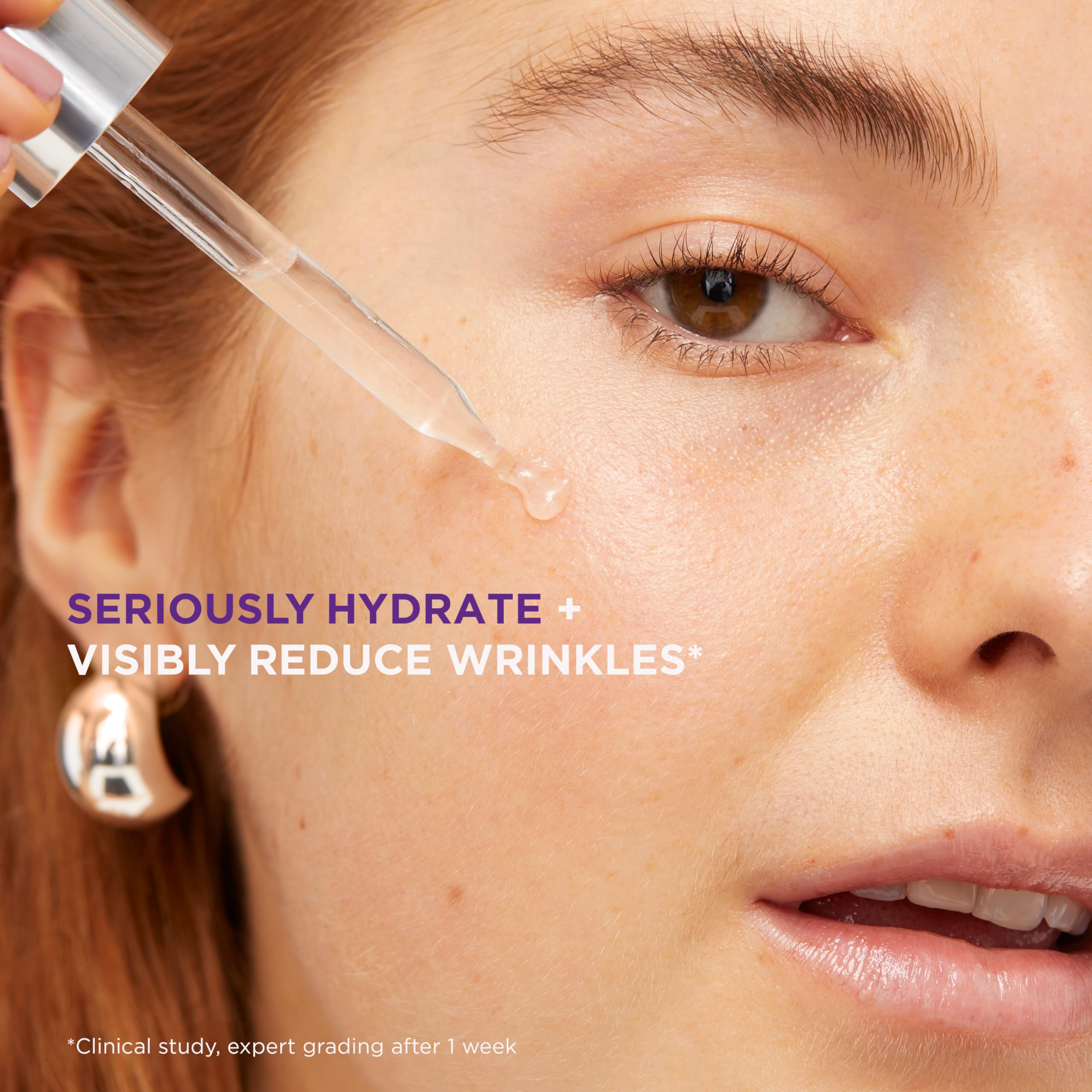 L'Oreal Paris serum on hand highlighting fast absorption and dewy finish