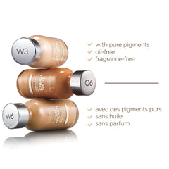 L'Oreal Paris 1 fl oz bottle next to a common object showing compact travel-friendly size