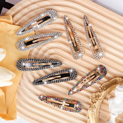 LOSANJI close-up of teardrop crystals highlighting precise setting and reflective shimmer