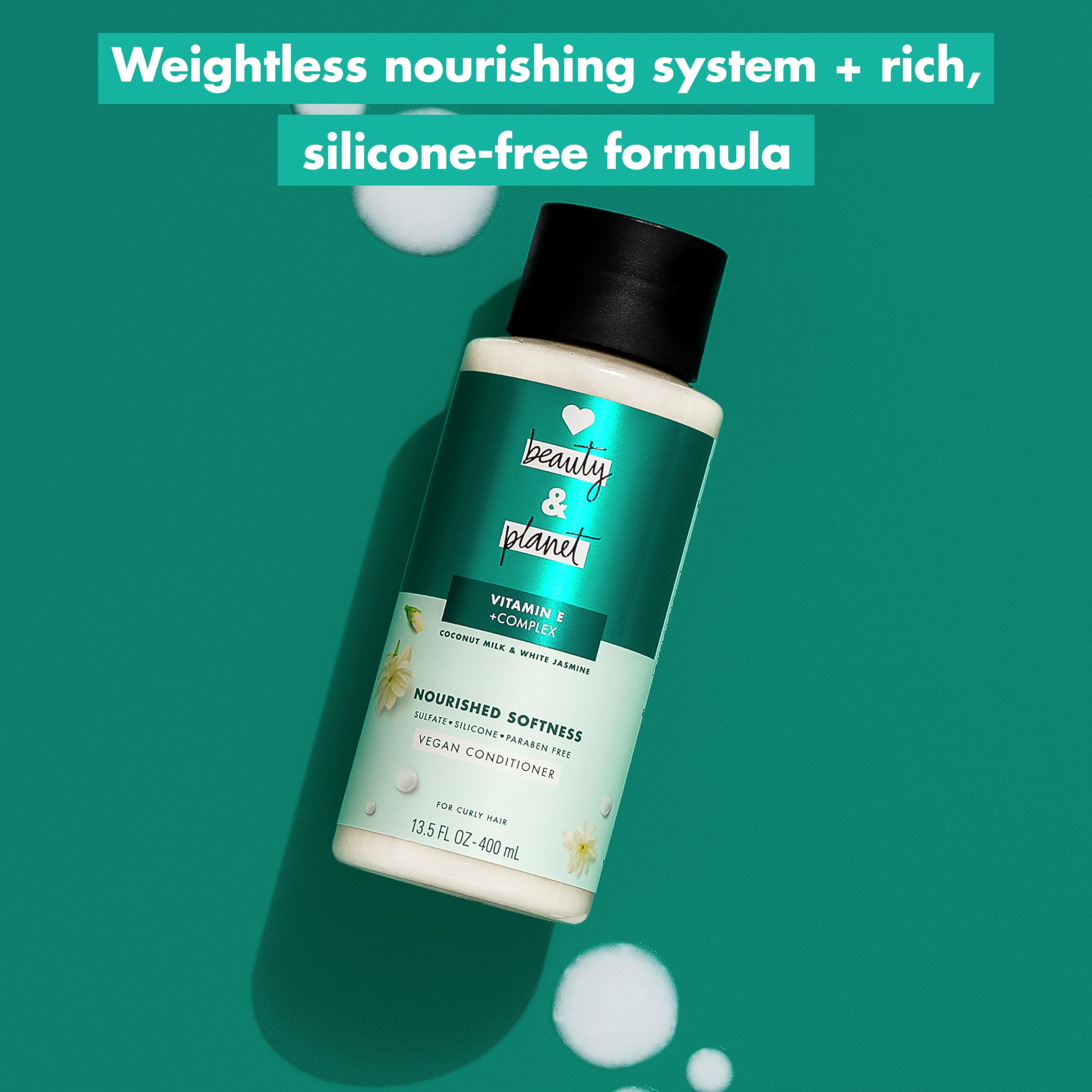 Love Beauty And Planet back label close-up listing ingredients and clean benefits