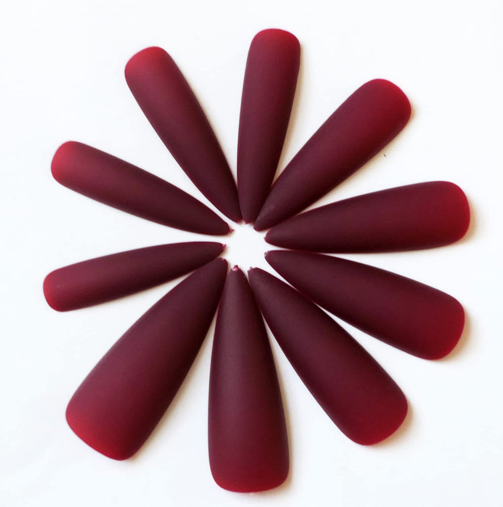 LoveOurHome lifestyle image at evening event showing bold matte burgundy style