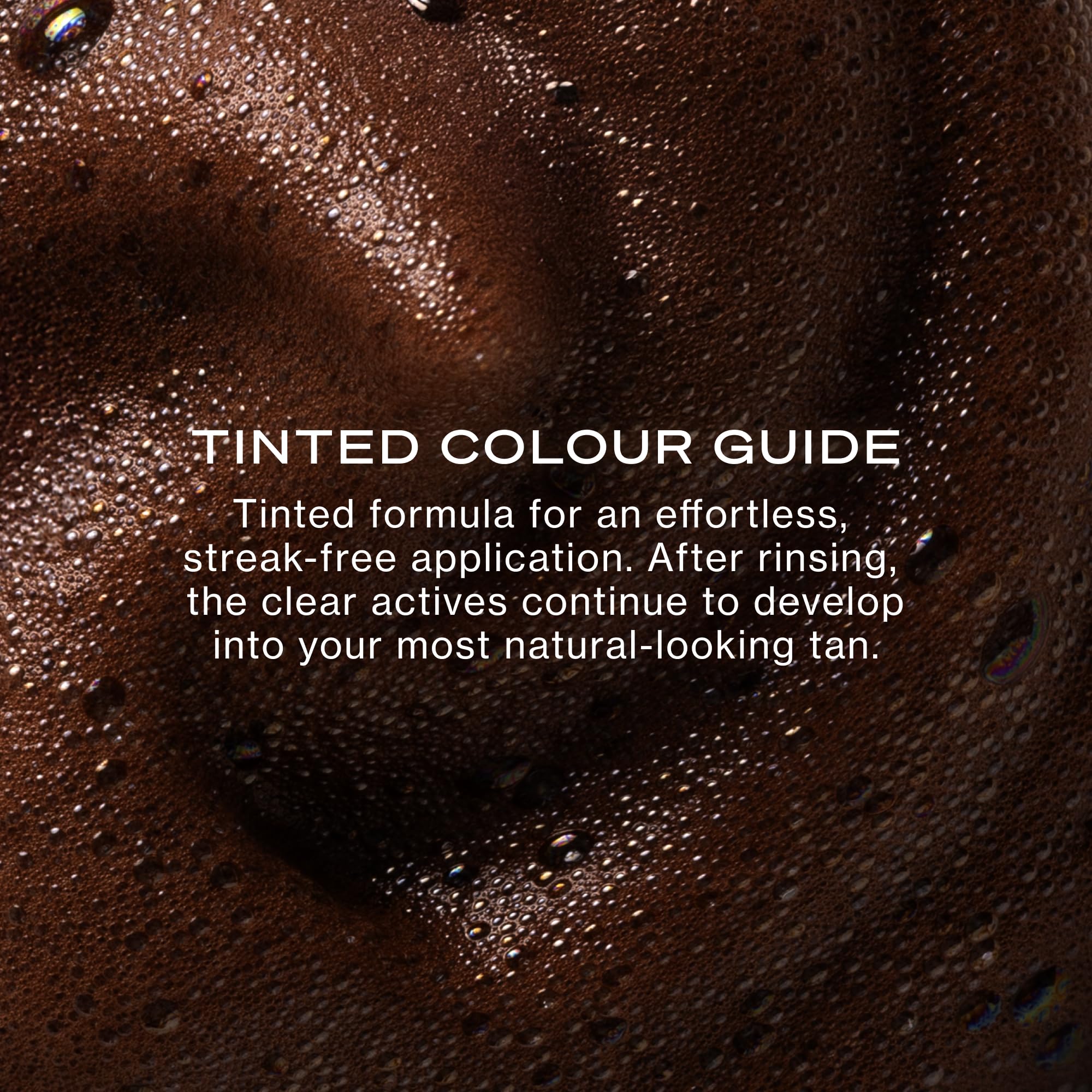 Loving Tan applied on arm showing even coverage and visible guide colour