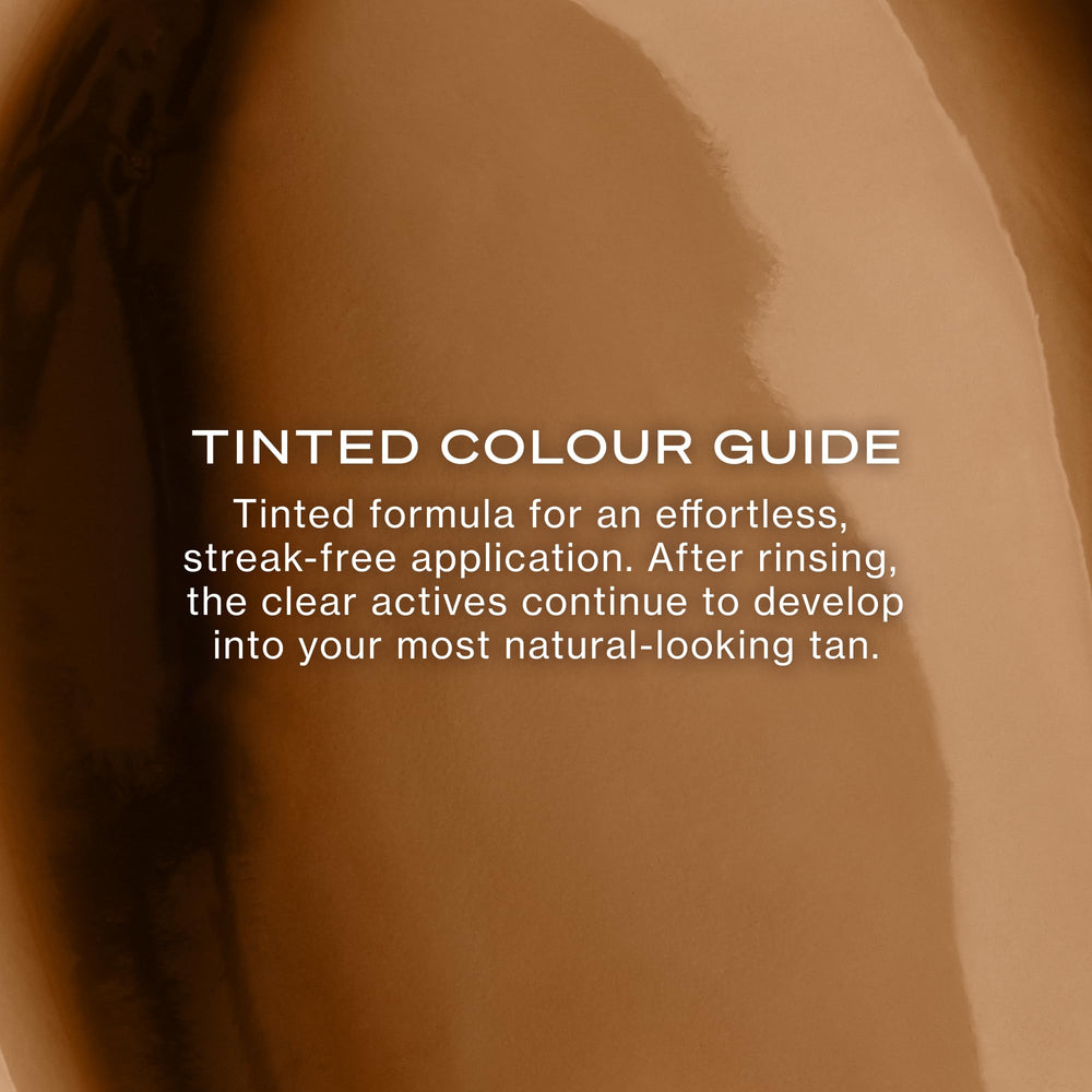 Applying Loving Tan with fingertips for even, streak-free facial blending
